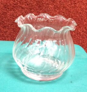 small glass swirled votive